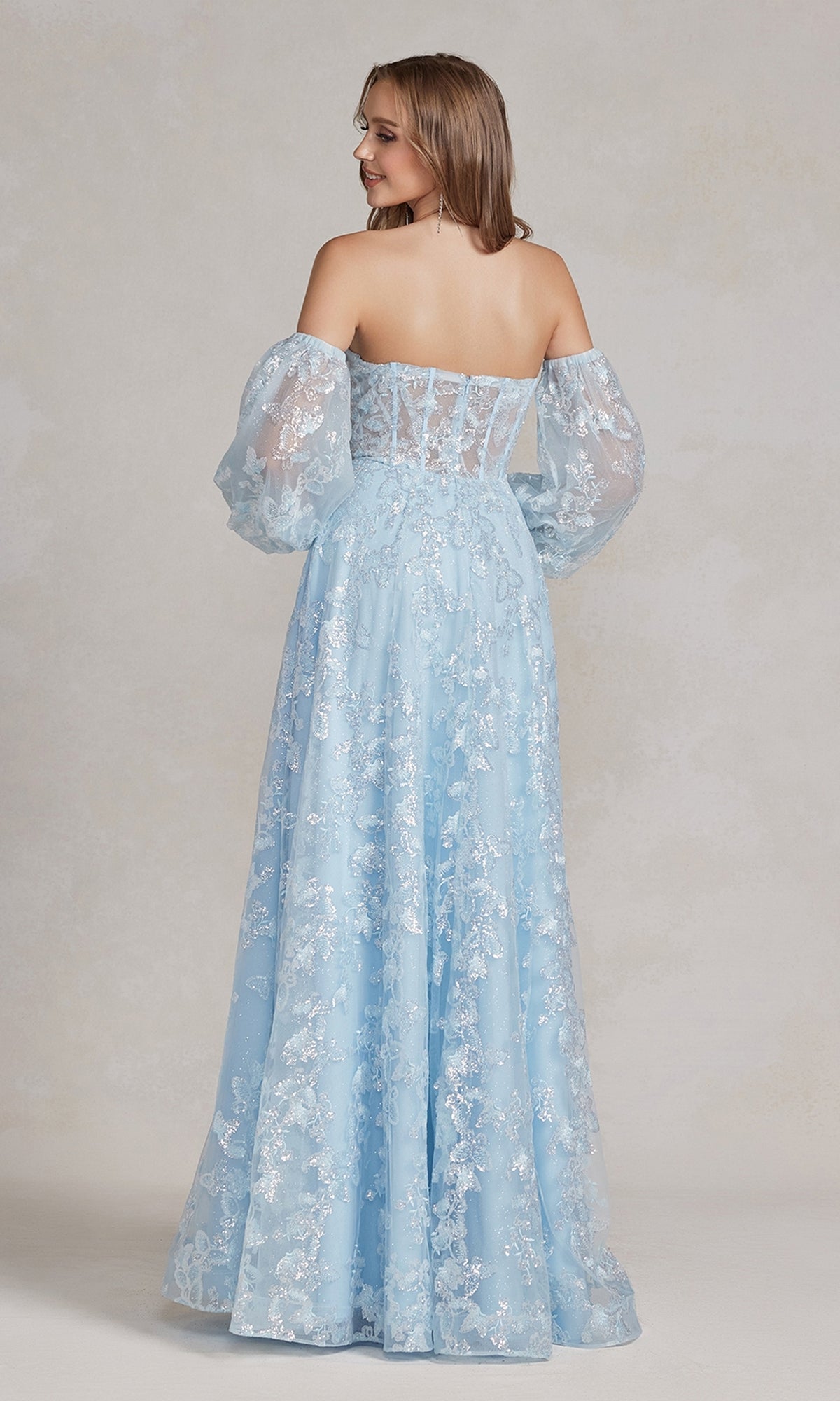 Woman wearing the Long Puff-Sleeve Prom Dress with Sheer Bodice in light blue lace, featuring off-shoulder design and removable sheer puff sleeves—shown from the back against a neutral background for an elegant, versatile look.